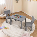 Grey kids plastic table and two-chair set: lifestyle in playroom with toy props.