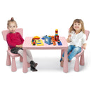 Pink kids plastic table and two-chair set: two children with toy props.
