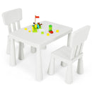White kids plastic table and two-chair set: alternate product angle with toy props.