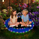 Blue saucer swing with LED lights illuminated