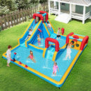 Water park set up outdoors with slide, water cannon and splash pool