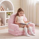 Pink cloud toddler flip-out sofa, seated reading example
