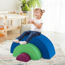 Three-Piece Rainbow Foam Climber with Washable Covers – nested rainbow in a playroom