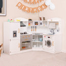 White corner play kitchen styled in a playroom