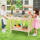 Children beside the Natural wooden mud kitchen in a garden, with example play accessories