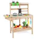 Natural wooden mud kitchen staged with example cookware, toy food and gardening tools