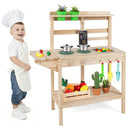 Child beside the Natural wooden mud kitchen with example accessories and plants