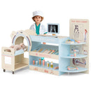 Child in an example costume behind the blue pretend doctor station