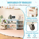 Blue pretend doctor station showing the toy trolley handle, lower storage area and caster wheel
