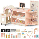 Pink pretend doctor station with toy scanner, trolley, eye-chart graphic and accessory assortment