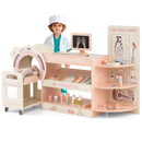 Child in an example costume behind the pink pretend doctor station
