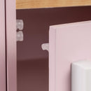 Pink close-up of the play kitchen cupboard door catch