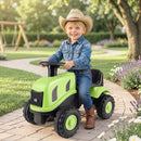 Child seated on tractor – Green