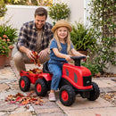 Adult supervising tractor play – Red