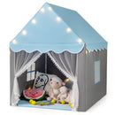 Blue-roof play tent with grey walls, gauze entrance curtains and star lights; decorative props shown