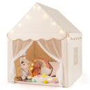 Beige play tent with gauze entrance curtains, mat and star lights; decorative props shown