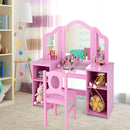 Pink vanity and matching chair in a styled room