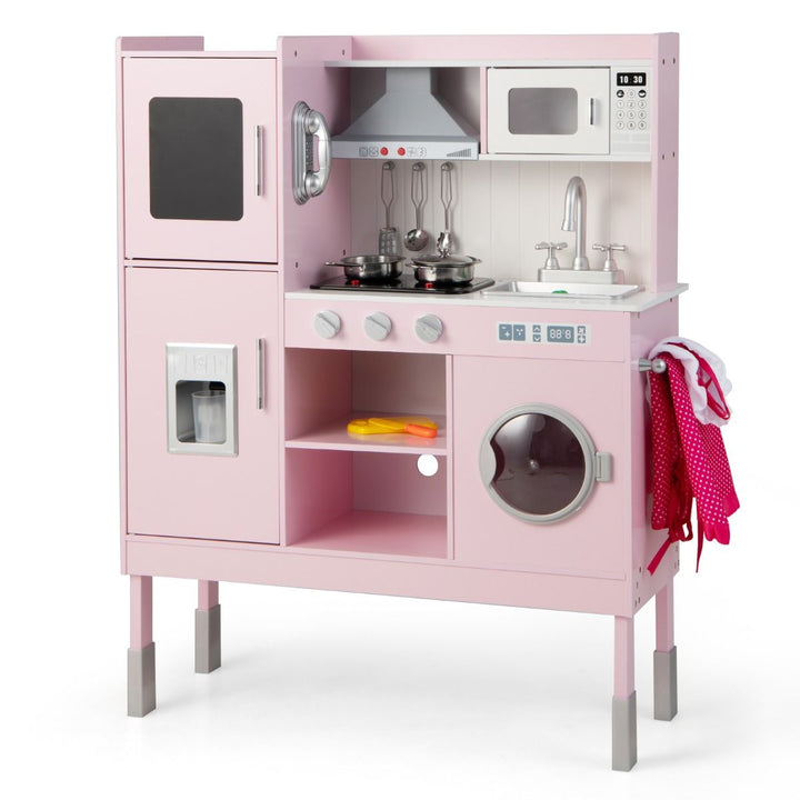 Pink play kitchen with tall toy fridge, range hood, microwave and washing machine