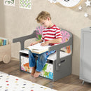Grey convertible kids bench with two patterned fabric bins: child reading on the bench