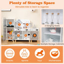 Grey play kitchen with opening storage cabinets and three utensil hooks