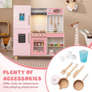 Pink play kitchen with included toy pot, pan, knife, two utensils, cup and four ice cubes