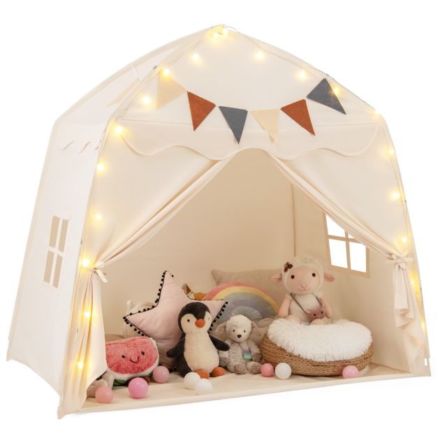 Beige dome play tent with tied-back curtains, decorative light string and pennants; toys and cushions are display props
