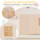 Beige playhouse tent showing roll-up door ties, the closed fabric door and two mesh windows