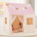 Pink-roof playhouse tent staged indoors with example books, cushions and toys that are not included