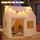 Pink-roof playhouse tent shown with glowing stars and decorative lights in an evening setting