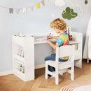 Child drawing at the white art desk and chair