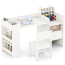 White art desk and chair styled with art supplies and storage box