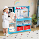 Child using the blue doctor play centre with a large example soft toy that is not included