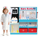 Child standing beside the blue doctor play centre and its supplied toy accessories