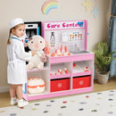 Child using the pink doctor play centre with a large example soft toy that is not included