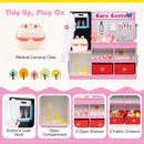 Pink doctor play centre showing its carrying case, coat hook, open compartments, shelves and two red fabric drawers
