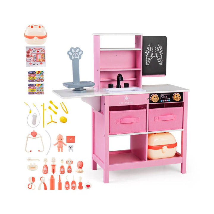 Pink wooden doctor play centre with toy scale, sink, blackboard and its displayed accessory assortment