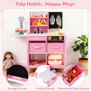 Pink doctor play centre showing its blackboard ledge, folding side worktop and removable fabric drawer