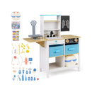 White wooden doctor play centre with toy scale, sink, blackboard and its displayed accessory assortment