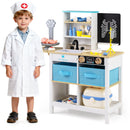 Child beside the white doctor play centre and its toy accessories