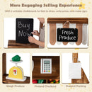 Brown wooden market stand showing two chalkboards, toy scale, pretend card reader and paper bag