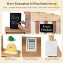 Natural wooden market stand showing two chalkboards, toy scale, pretend card reader and paper bag