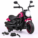 Pink 6V kids motorcycle with training wheels and charging equipment