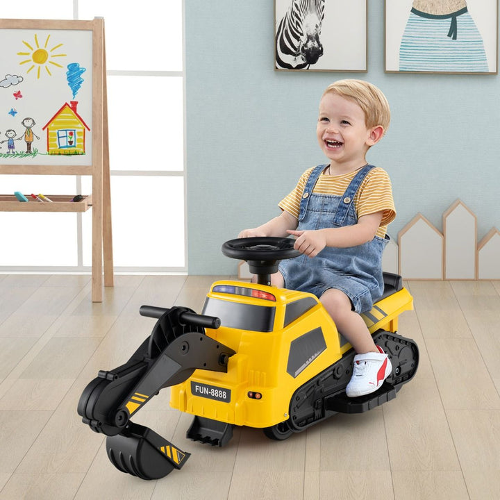 Yellow 6V construction ride-on in an indoor play setting