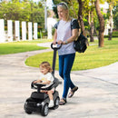 Black toddler toy push car shown with an adult using the parent handle