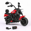 Red 6V kids motorcycle with training wheels and matching charging equipment