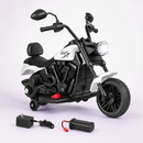 White 6V kids motorcycle with training wheels and matching charging equipment