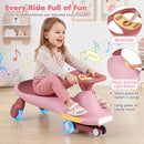 Pink wiggle car music and horn controls; 3 AA batteries not included