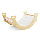 Natural wooden climbing arch used as a rocker with its white cushion
