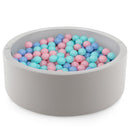 Grey round foam ball pit with pastel play balls