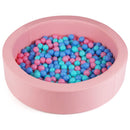 Pink round PU-covered foam ball pit with colourful play balls